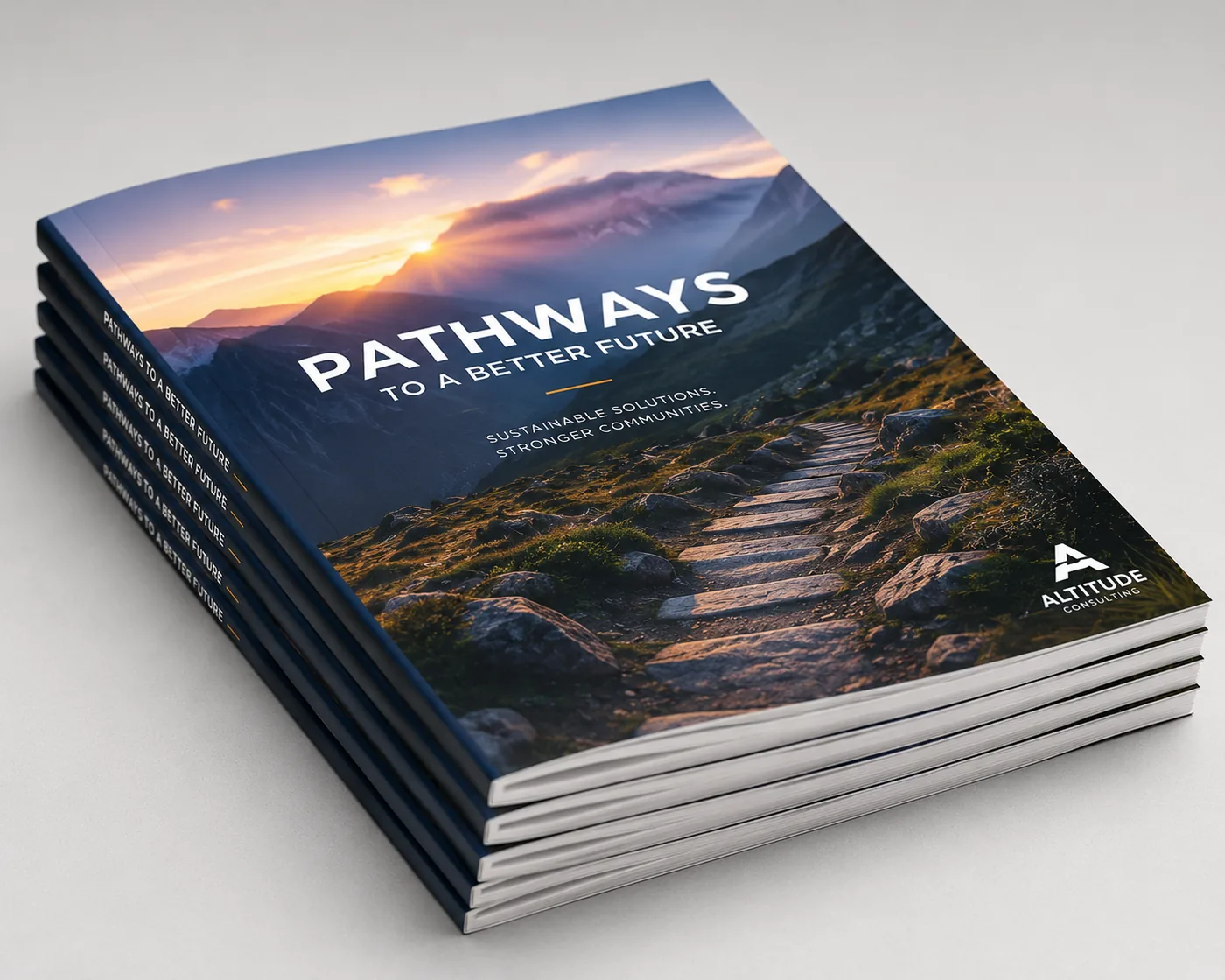 Stack of perfect-bound softcover books with full-color printed covers