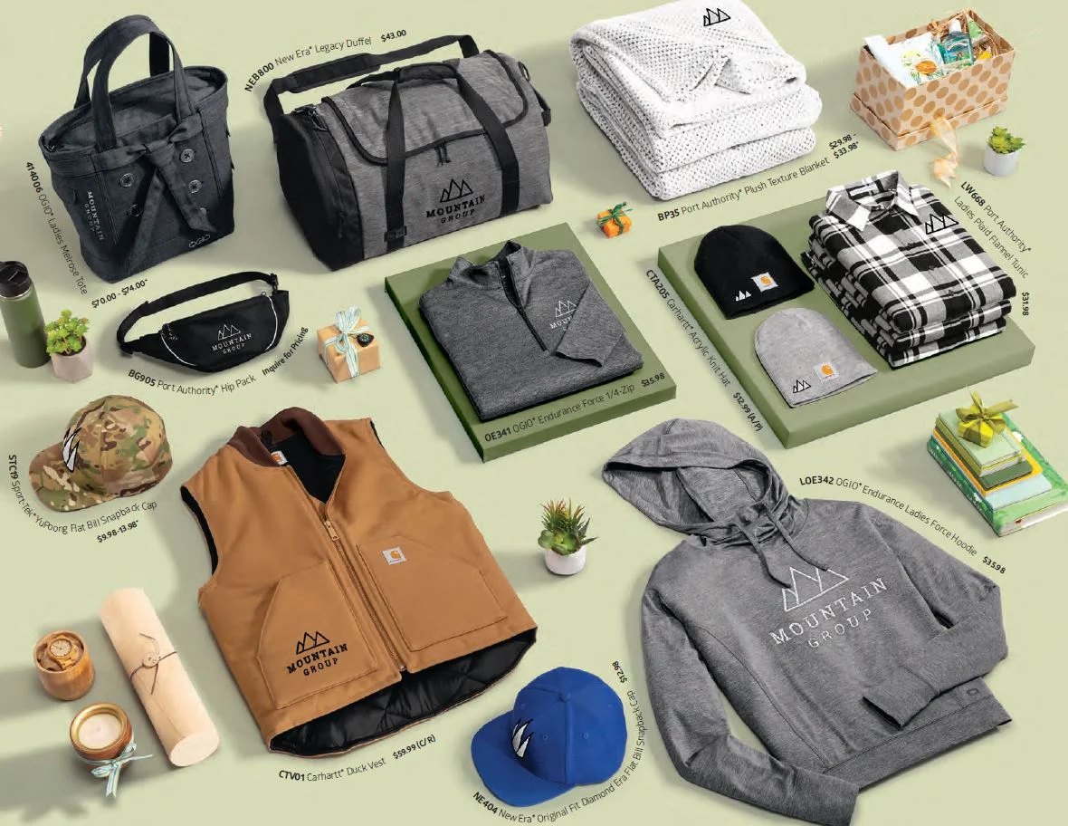 Corporate gift sets with branded notebooks, bottles, and accessories