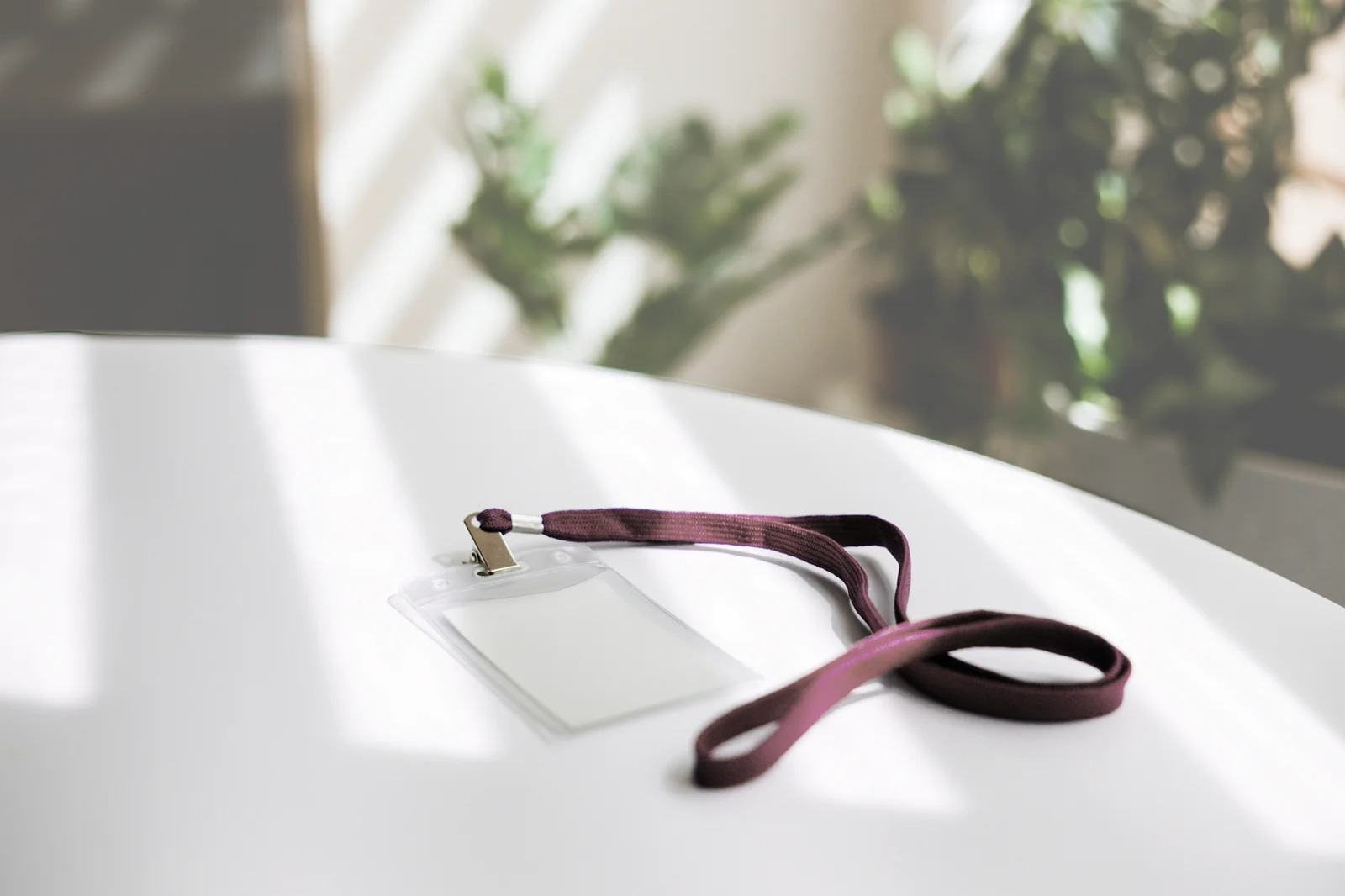 Personalized ID badge with printed name and lanyard
