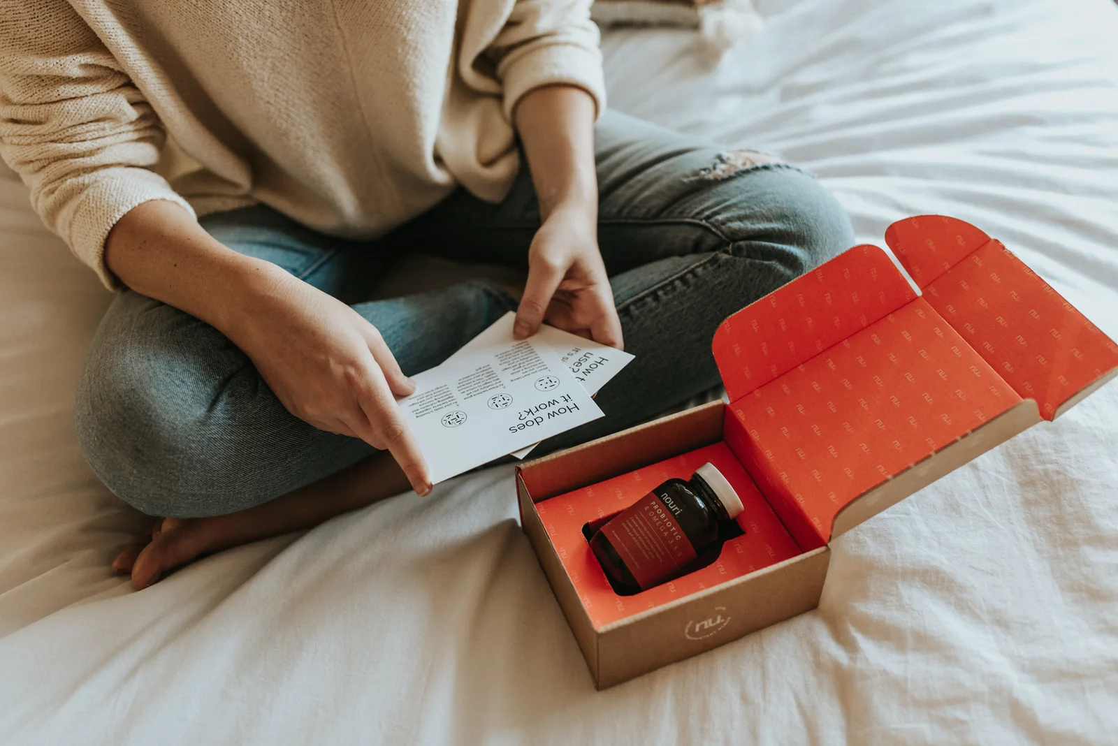 Supplement bottle in branded box
